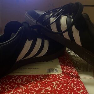 #42 Adidas Samba Black w/ White Stripes women sz7. NWOT